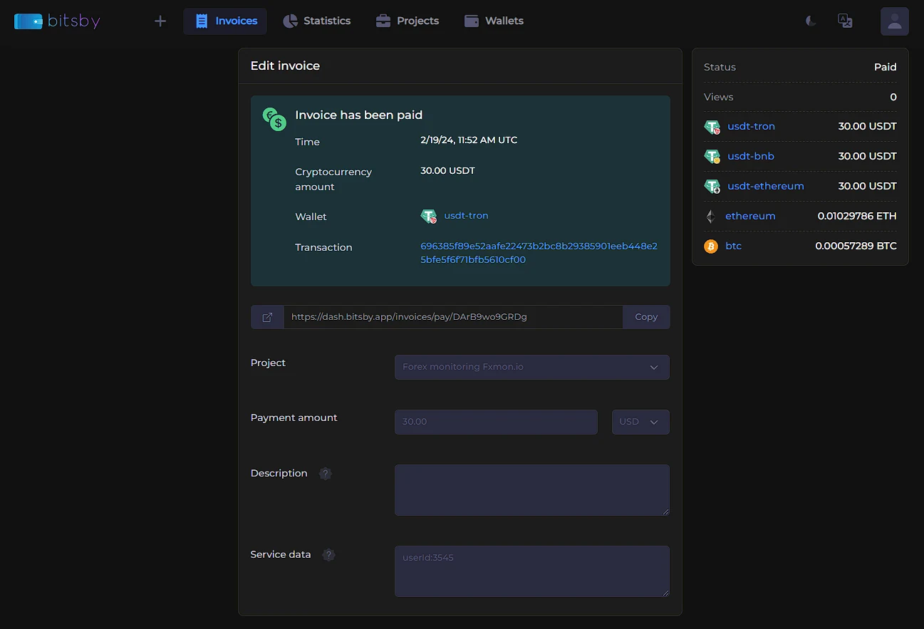 Paid invoice card: payment time, crypto amount, wallet, and transaction hash
