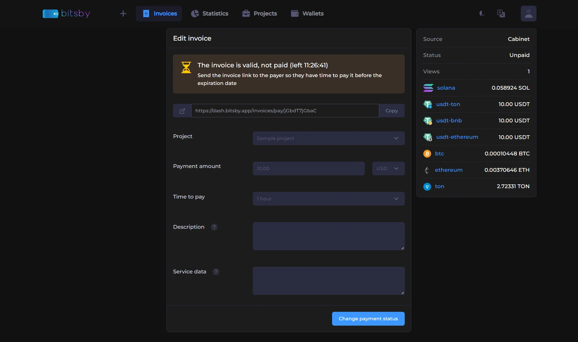 A created invoice: the payment page link and the amounts due in each cryptocurrency